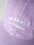 REALITY IS BORING CAP